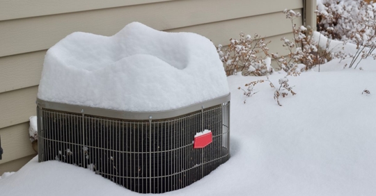 hvac covered in snow