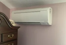 Ten-year-old Daikin outdoor mini split unit before replacement in Pepperell, Massachusetts.