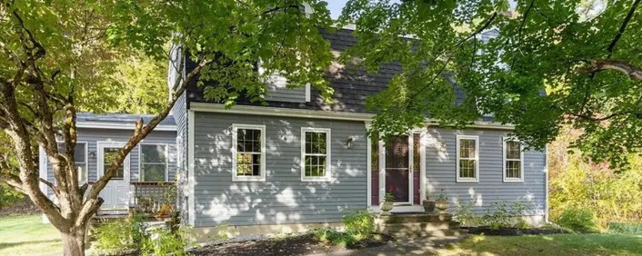 Mitsubishi Hyper-Heat ductless heat pump replacement installed at a Dutch Colonial home in Pepperell, Massachusetts.